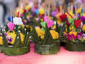 Close-up of pink flowers on table