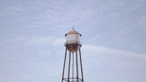 Low angle view of water tower against sky