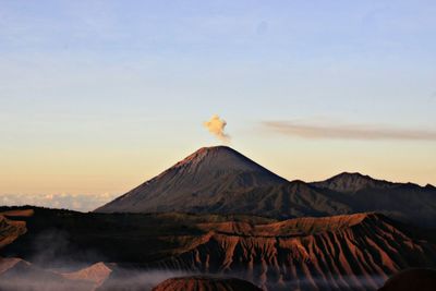 View of volcanic mountain against sky