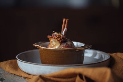 Close-up of baked apple on plate