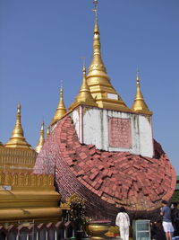 Temple against clear blue sky