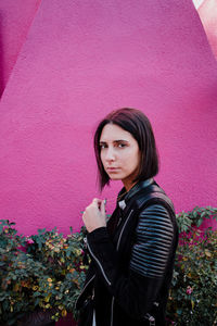 Portrait of woman with pink flowers