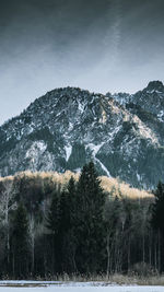 Scenic view of mountains against sky during winter