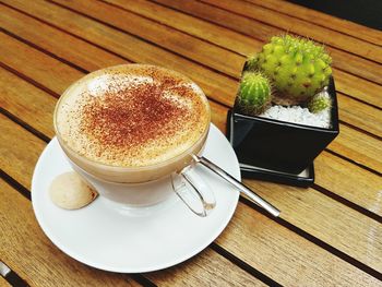 Close-up of coffee served on table