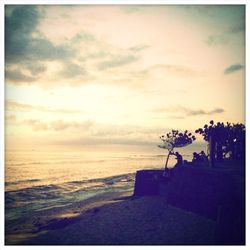 Scenic view of sea at sunset