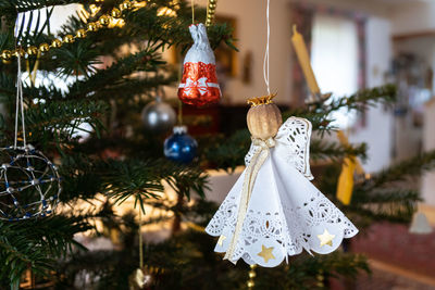 Close-up of christmas decoration hanging on tree