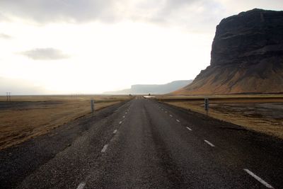 Road on landscape against sky