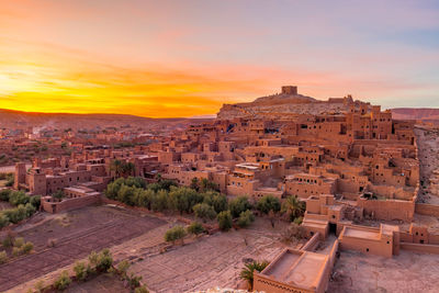 High angle view of townscape against sky during sunset