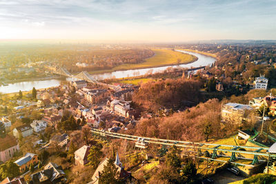 High angle view of river amidst buildings in city