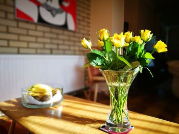 Close-up of flowers in vase on table