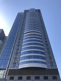 Low angle view of modern buildings against clear sky