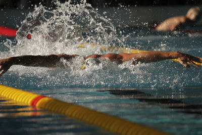 Man swimming in pool