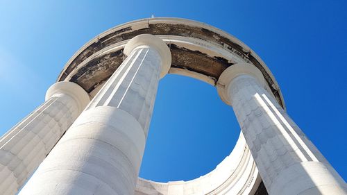 Low angle view of building against blue sky