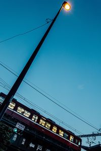 Low angle view of train against sky