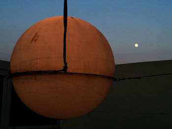 Low angle view of moon against sky