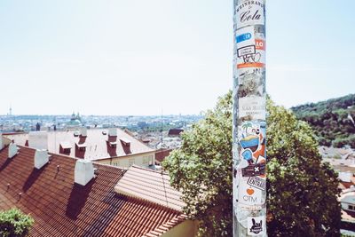 High angle view of text on building against sky