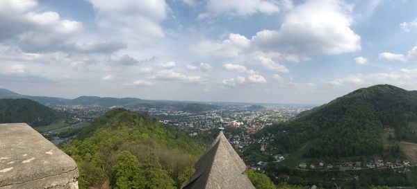 Panoramic view of buildings in city against sky