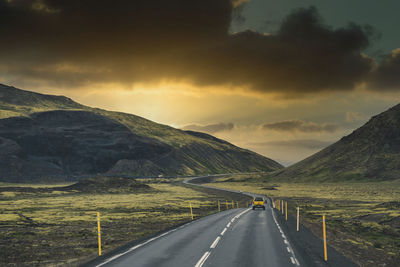 Empty road or highway in the natural environment of iceland on a cloudy day