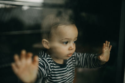 Portrait of cute boy looking at camera