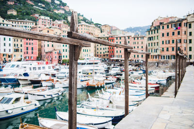 Boats moored in city