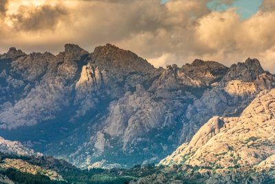 Panoramic view of snowcapped mountains against sky