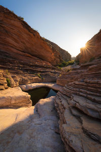 Scenic view of rock formations against sky