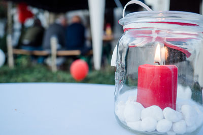 Close-up of candles on table