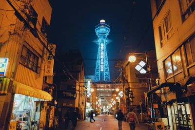 Illuminated buildings in city at night