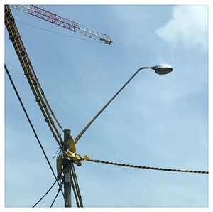 Low angle view of electricity pylon