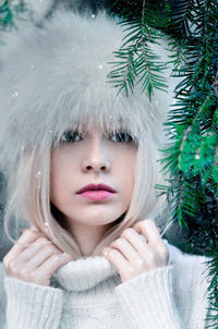 Close-up of young woman in winter