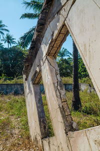 Low angle view of old built structure against sky