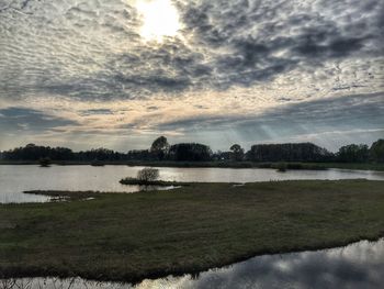 Scenic view of lake against sky