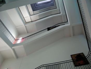 Low angle view of spiral staircase in building