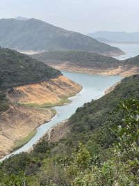 High angle view of landscape and mountains against sky