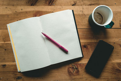 High angle view of coffee cup on table