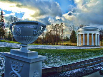 Water fountain against sky during winter