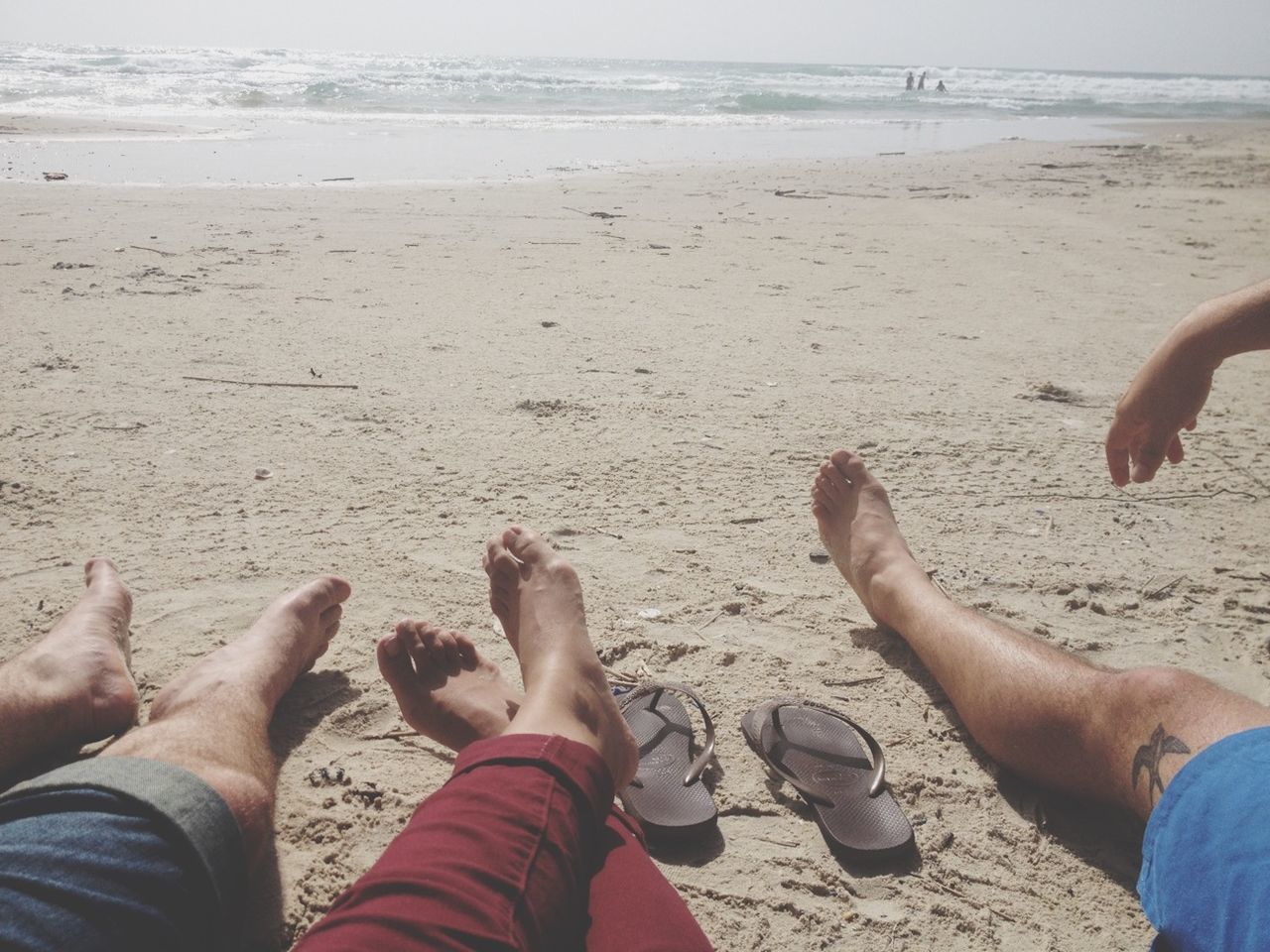 beach, sand, sea, shore, low section, water, leisure activity, lifestyles, vacations, person, barefoot, relaxation, horizon over water, summer, sunlight, nature