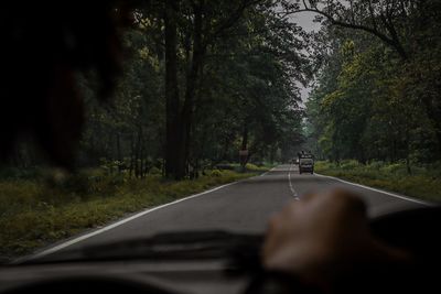 Road seen through car windshield