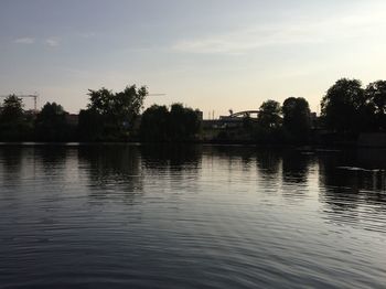 Scenic view of lake at sunset