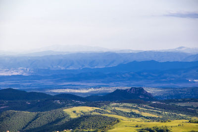 Mountain landscape in georgia. landscape from didgori road. clouds and blue sky.