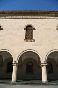 Low angle view of old building against clear sky