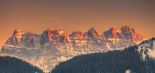 Scenic view of mountain against sky during sunset