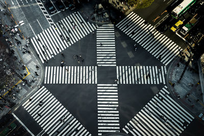 High angle view of road sign on city street