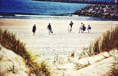 People enjoying at beach