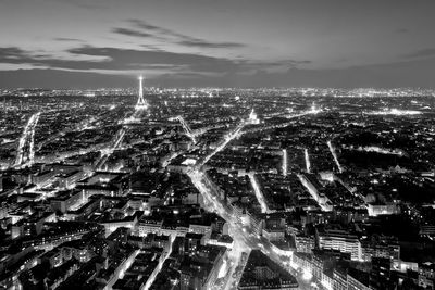 High angle view of illuminated city buildings at night