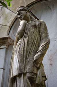 Low angle view of statue against sky