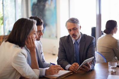 Business colleagues working at office