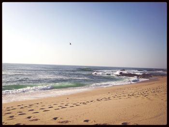 Scenic view of sea against clear sky