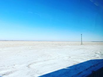 Scenic view of landscape against clear blue sky