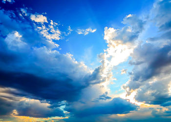 Low angle view of blue sky and clouds